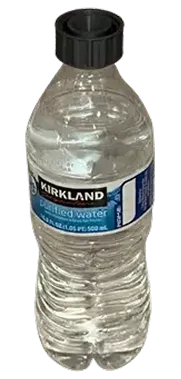 Kirkland water bottle fitted with the irrigation cap
